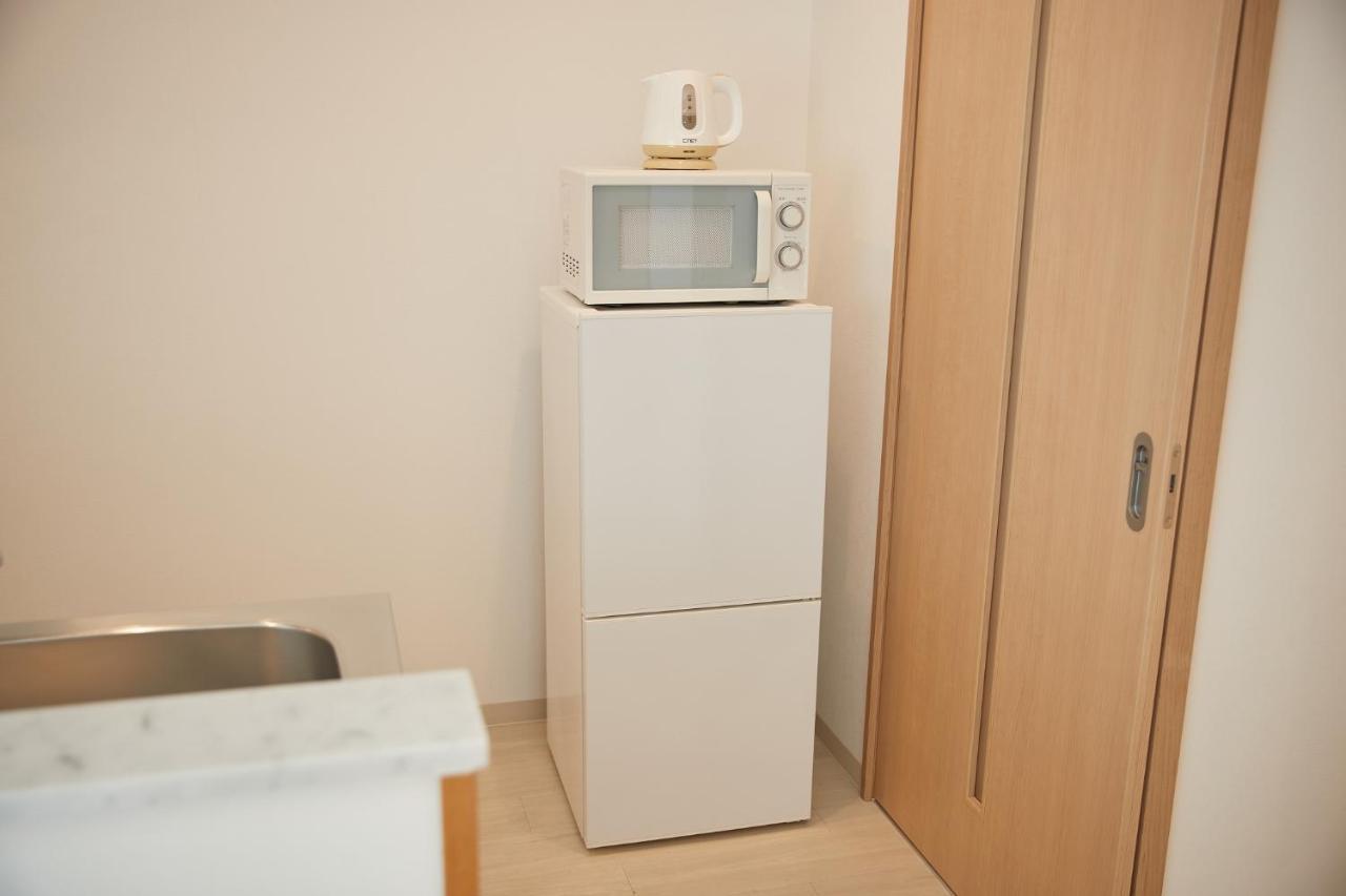 New Normal Hotel In Nago ニューノーマルホテルイン名護 ภายนอก รูปภาพ