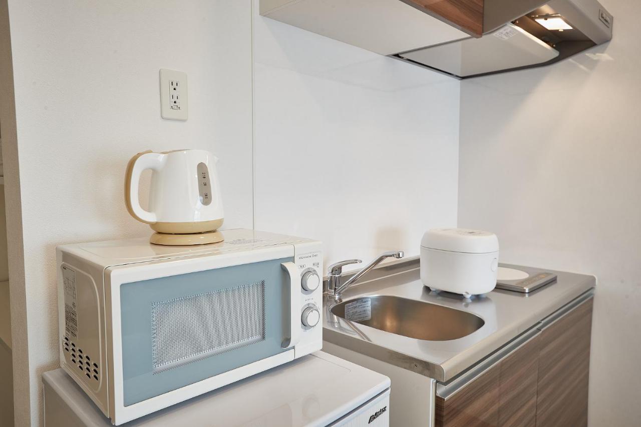 New Normal Hotel In Nago ニューノーマルホテルイン名護 ภายนอก รูปภาพ